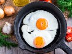 Смажені яйця з часником