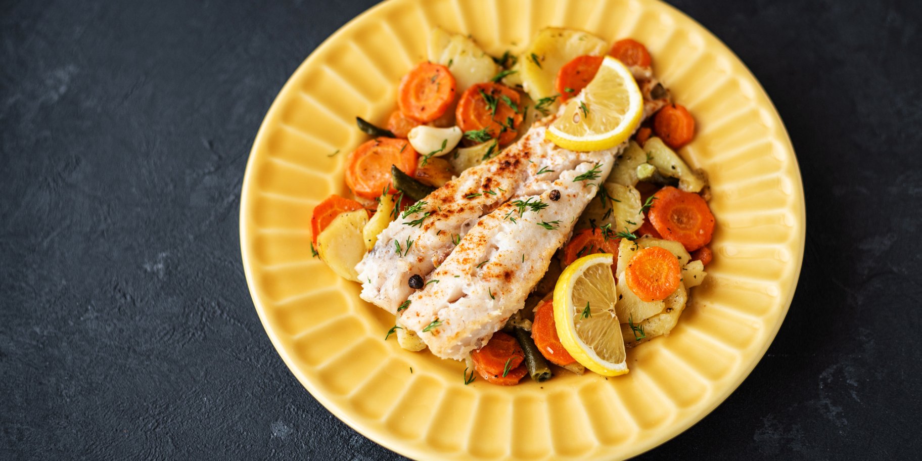 Риба з лимоном і овочами