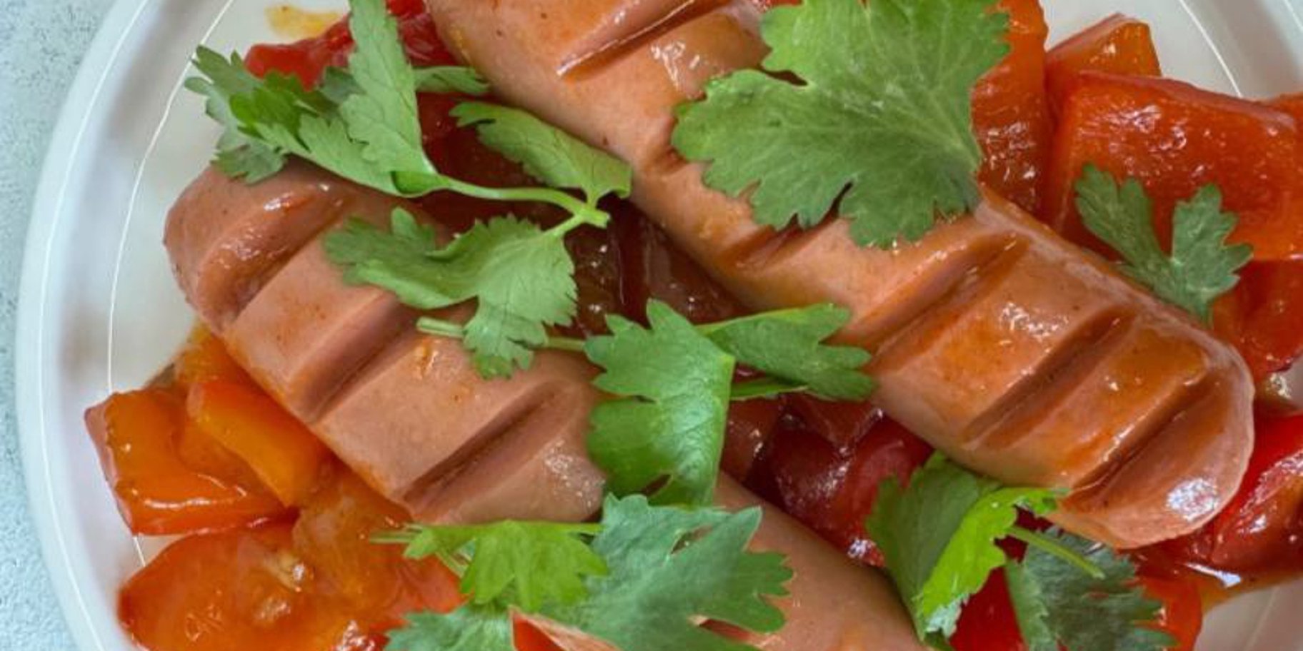 Сосиски в соусі