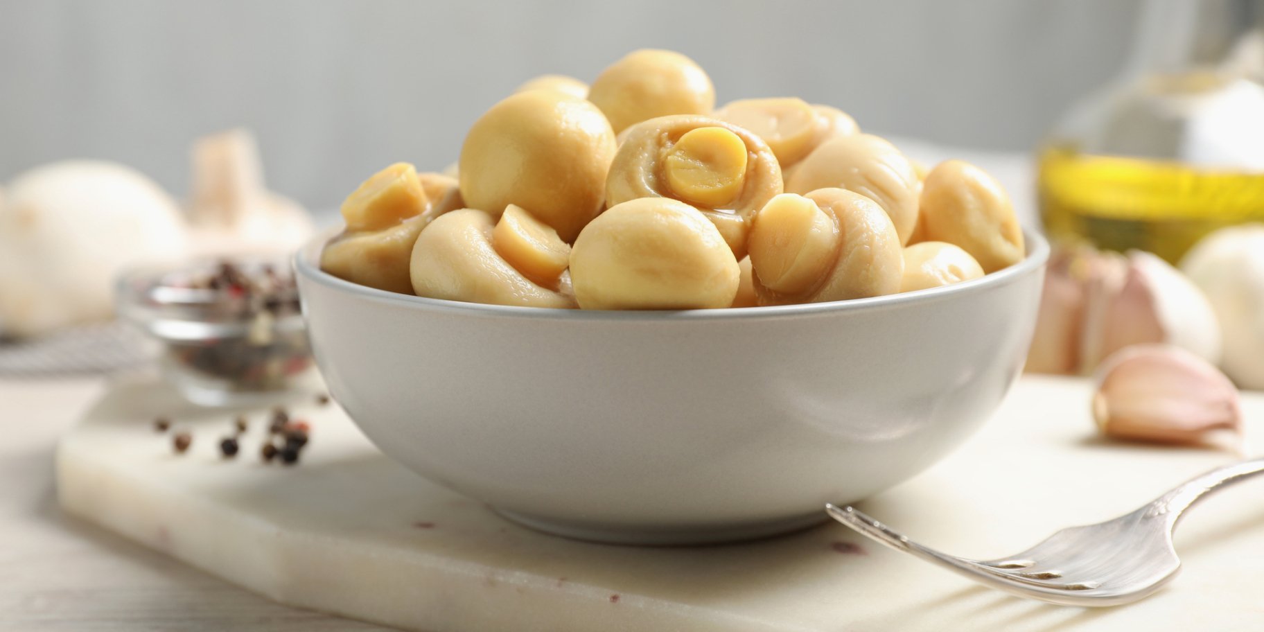 Мариновані гриби шампіньйони