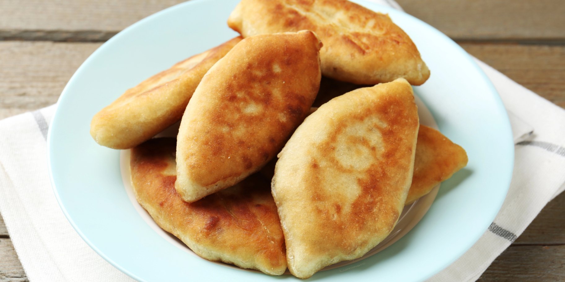 Смажені дріжджові пиріжки з картоплею