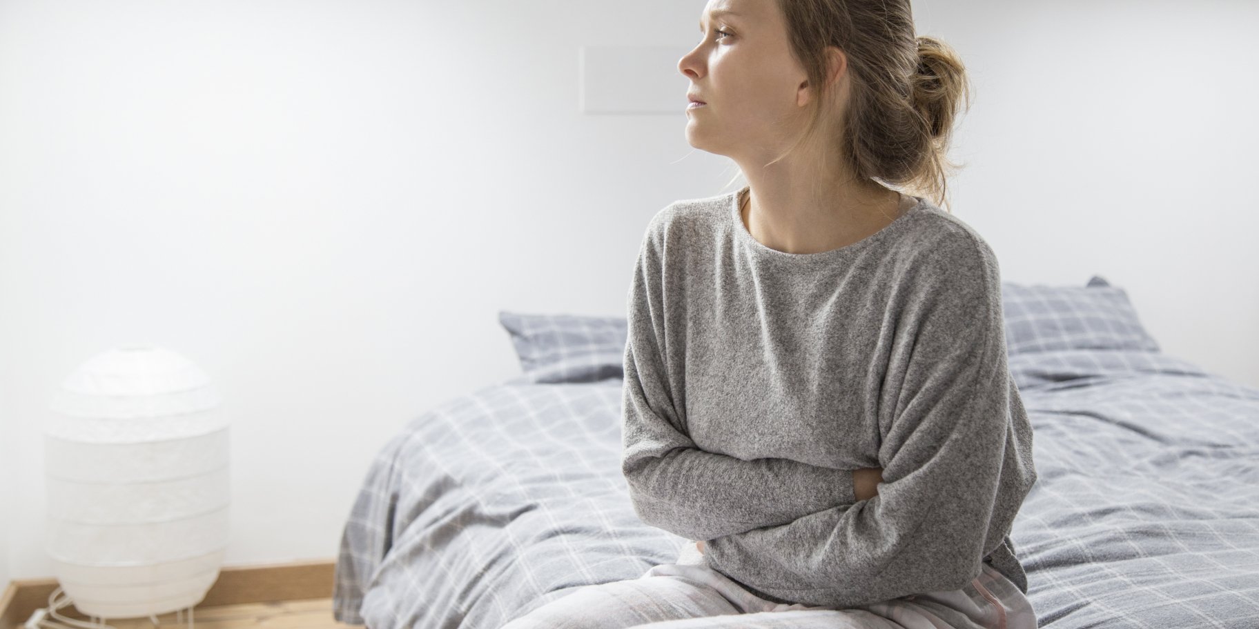 У жінки болить живіт