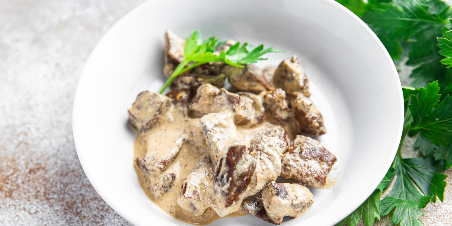 Курячі шлунки у сметані