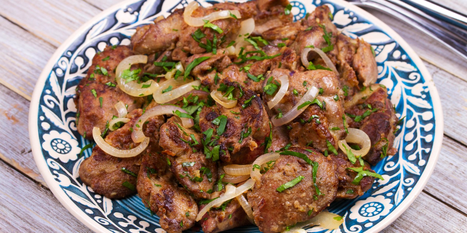 Свинина з цибулею в духовці