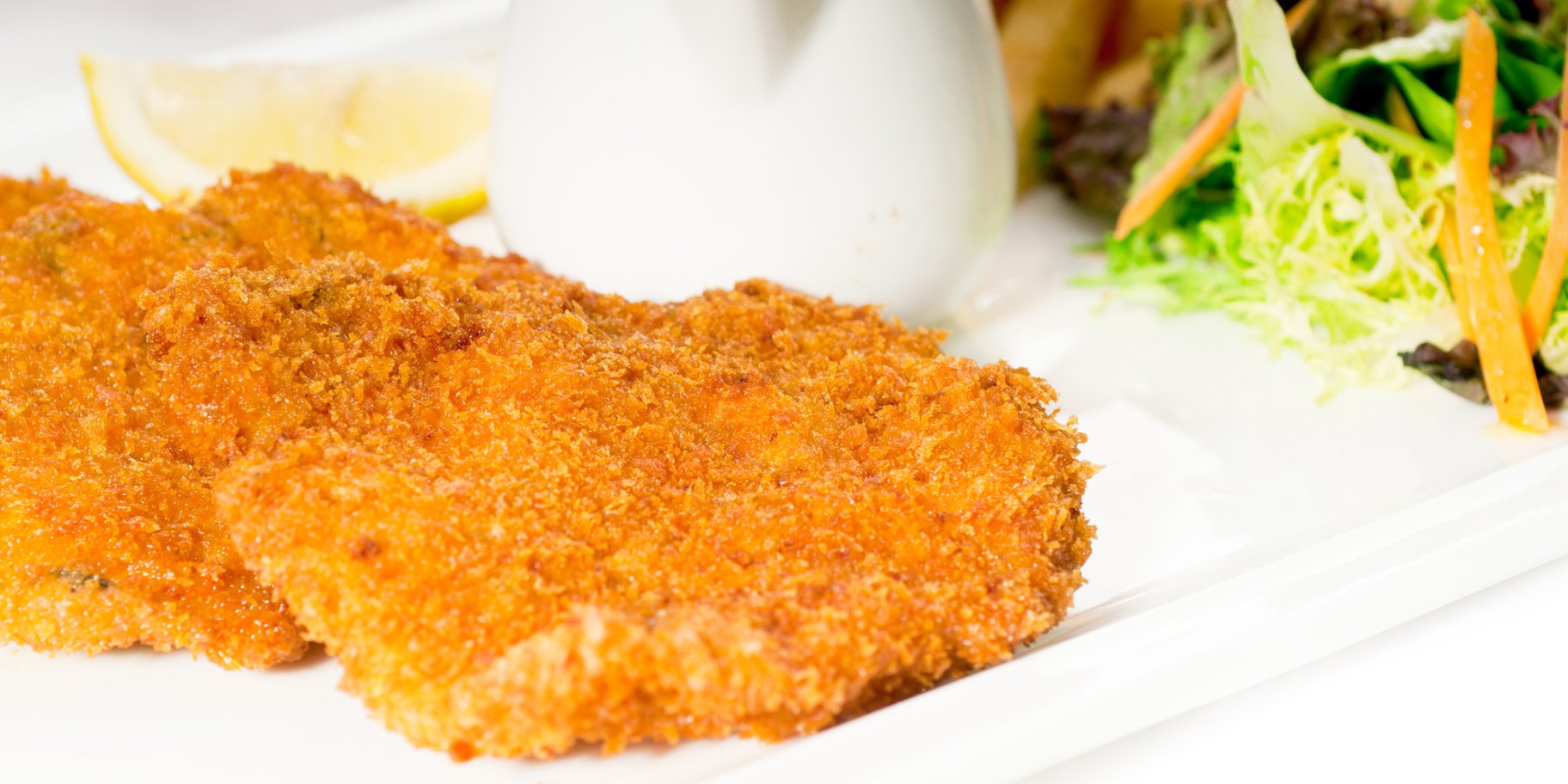 Свиной биток в картофельной панировке