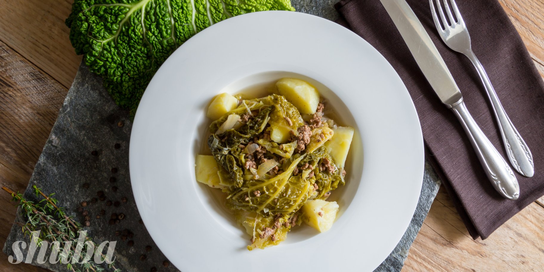 Печеня із савойською капустою, картоплею та яловичим фаршем
