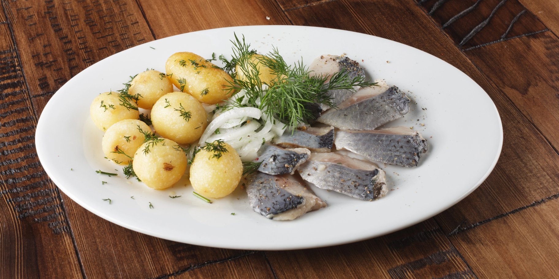 Картопля з оселедцем