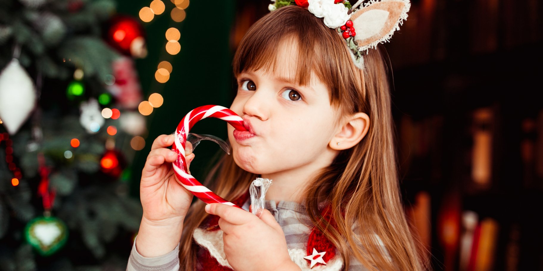 Дівчинка з цукеркою
