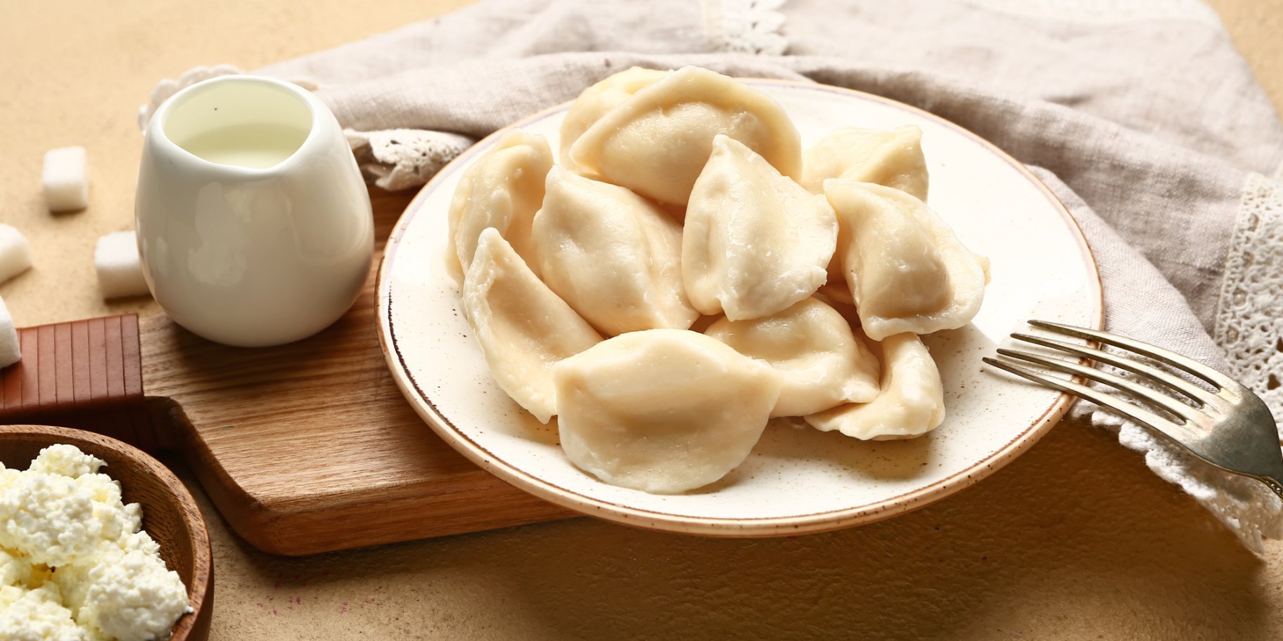 Вареники на сметані із сиром
