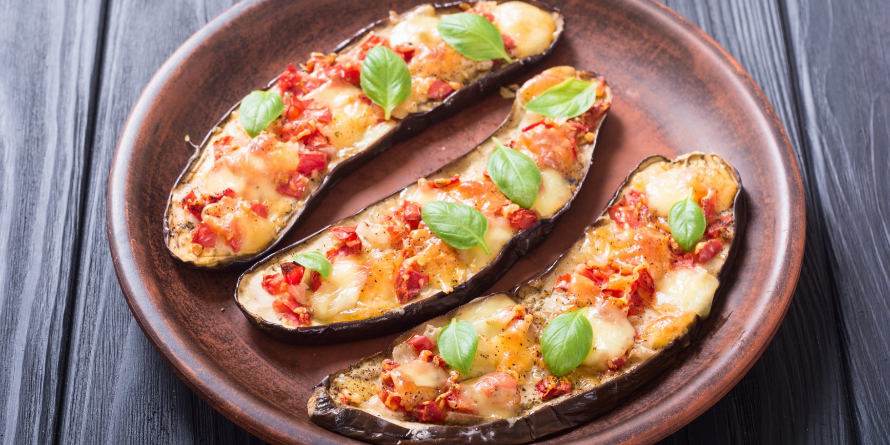 Фаршировані баклажани під сиром