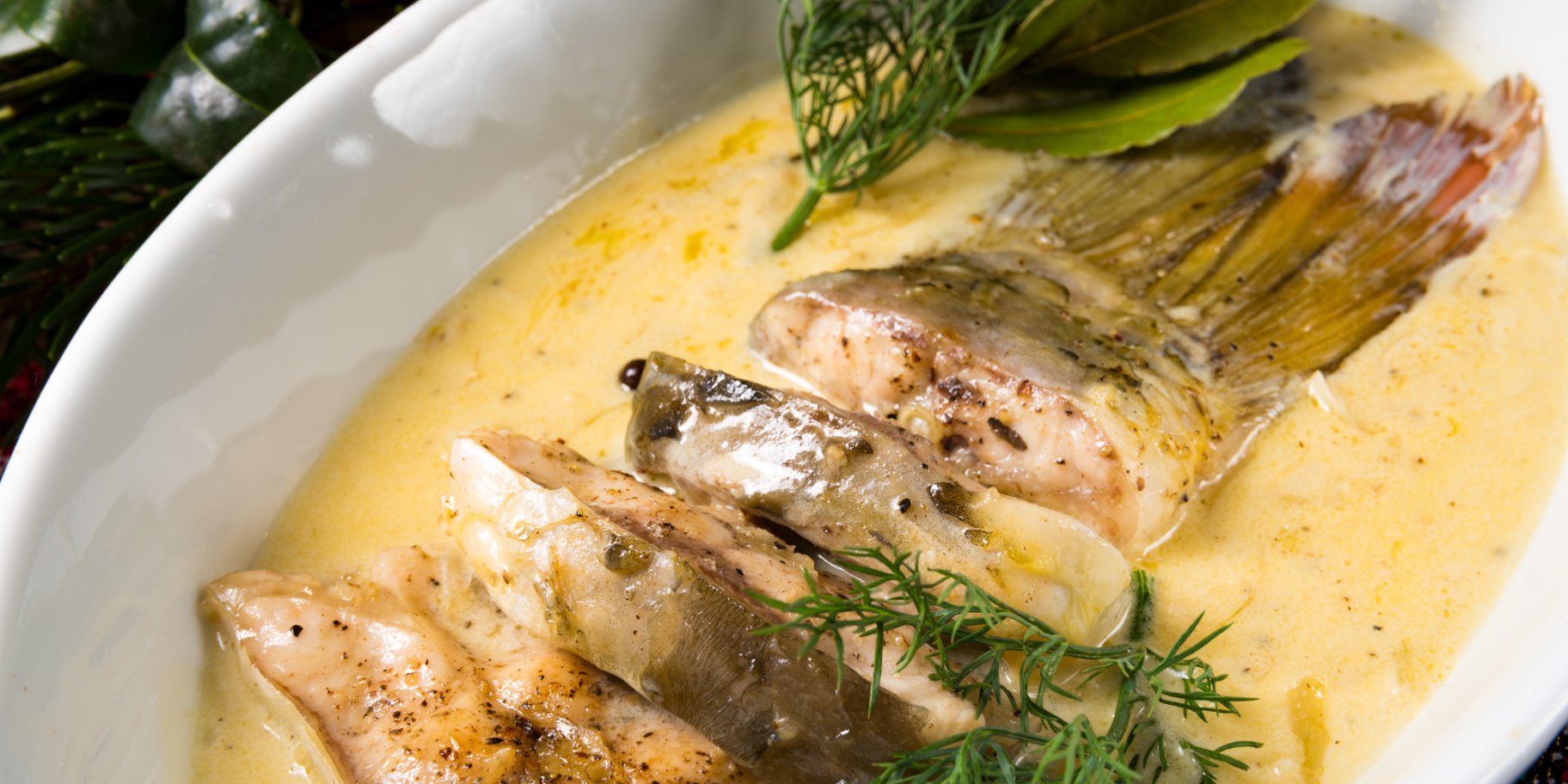 Риба в сирному соусі