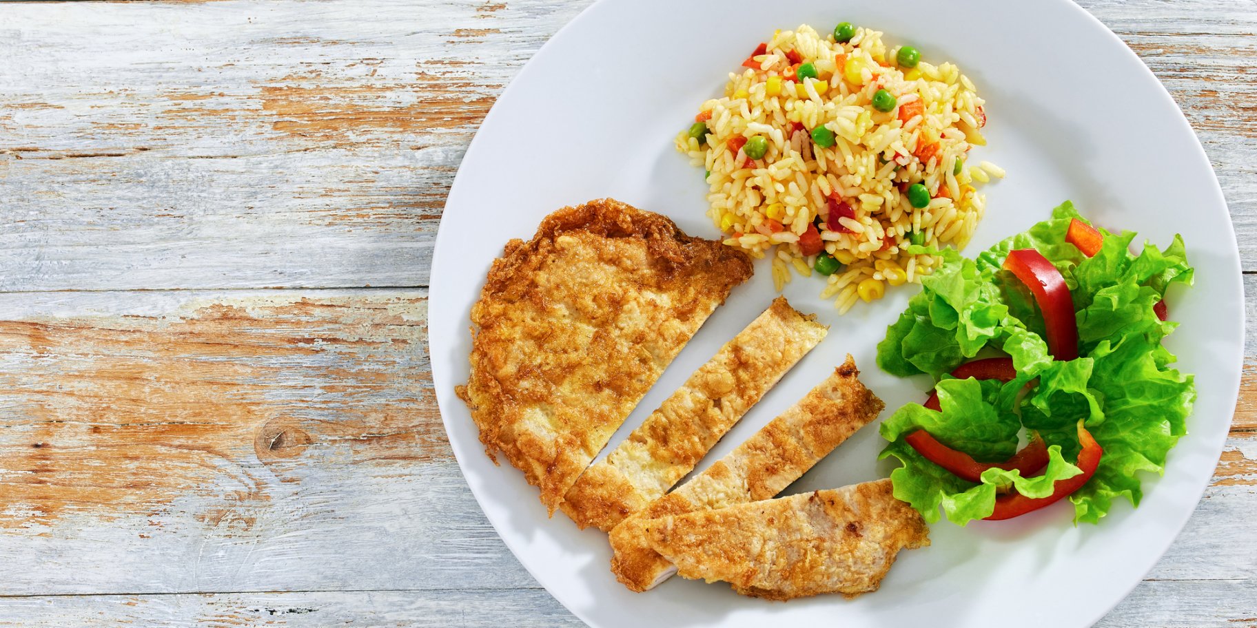 куриные отбивные с овощами и рисом