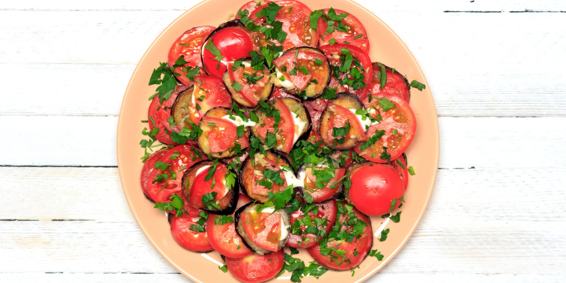 Баклажани з томатами та часником