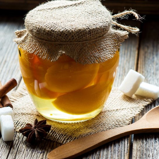 Мариновані персики