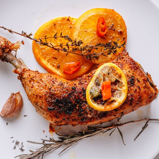 Курячі гомілки з апельсинами