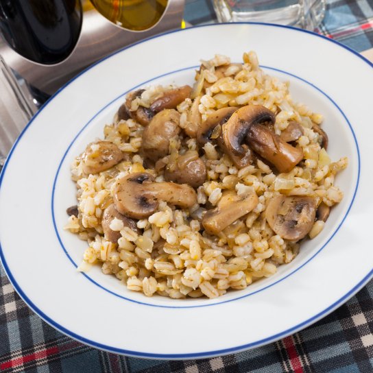 Спельтова каша зі смаженими грибами