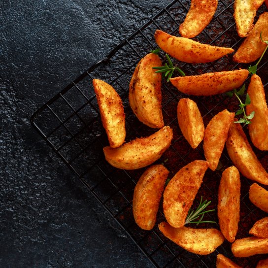 Картопляні скибочки зі спеціями