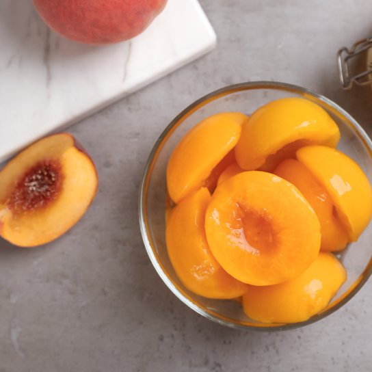 Персики у сиропі