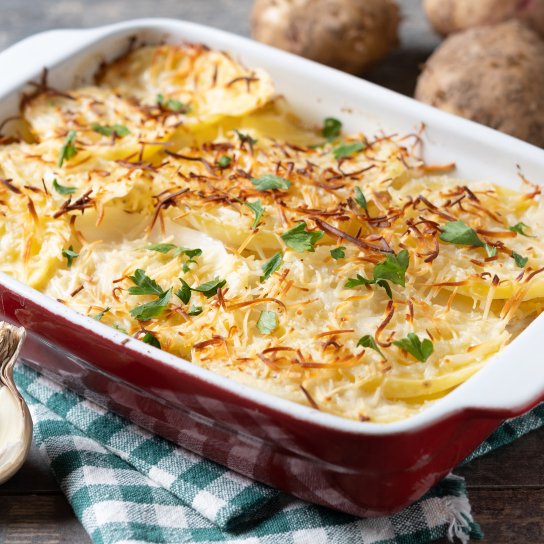 Картопляна запіканка зі шпротами