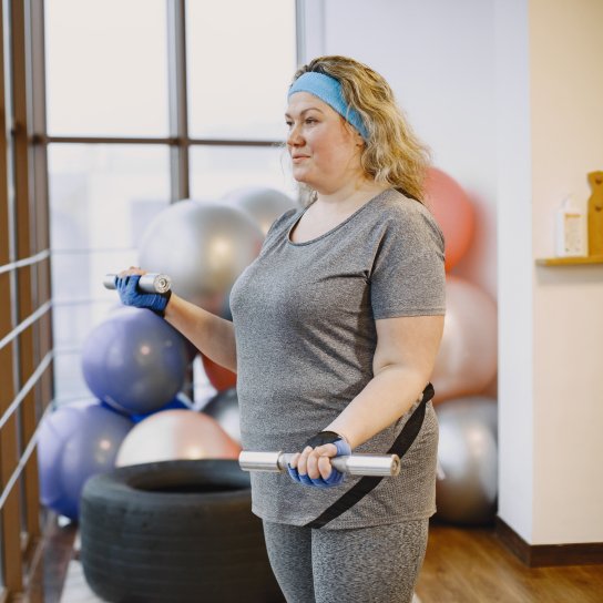 Жінка з зайвими кілограмами