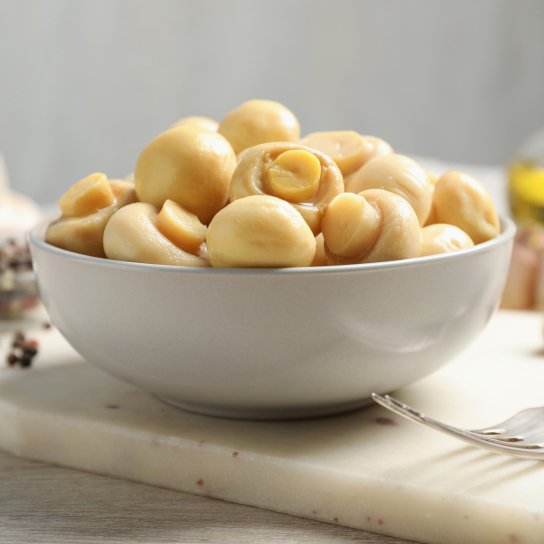 Мариновані гриби шампіньйони