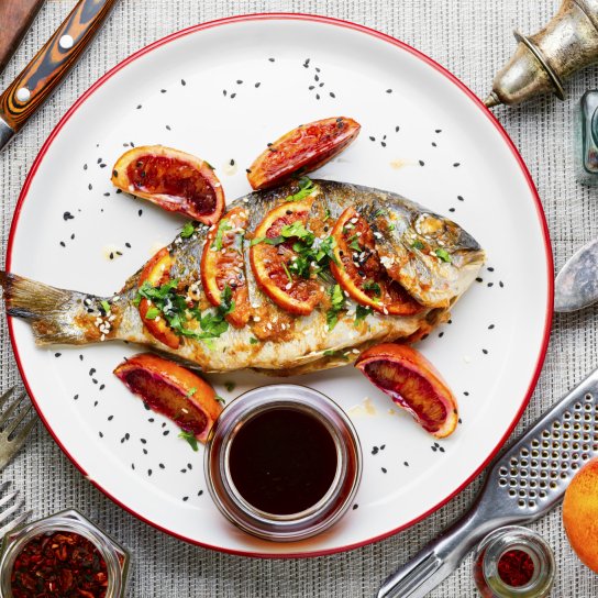 Запечена дорада з цитрусами