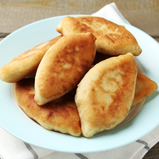 Смажені дріжджові пиріжки з картоплею