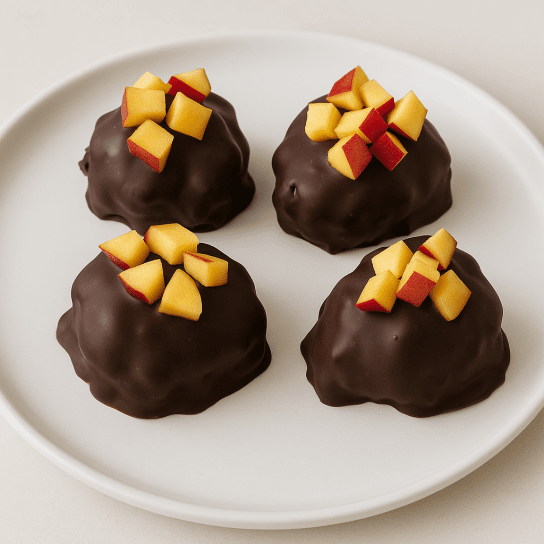 Закуска з персиками в чорному шоколаді