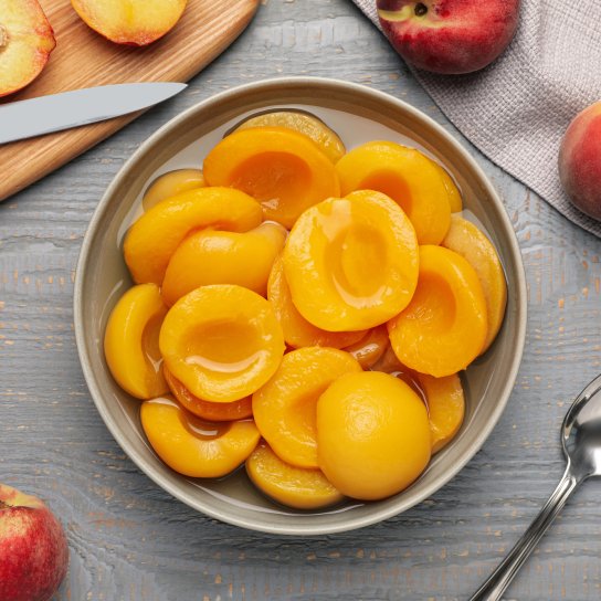 Персики в сиропі