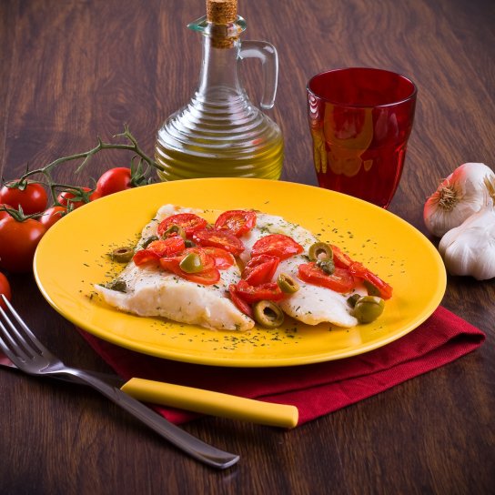 Минтай з томатами