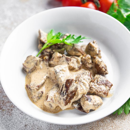 Курячі шлунки у сметані