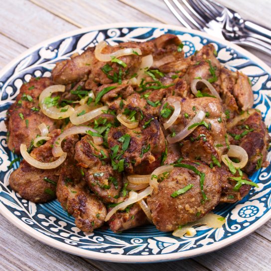 Свинина з цибулею в духовці