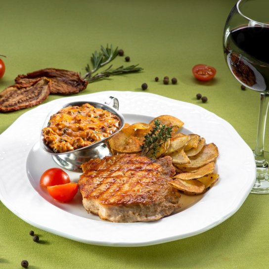 Ескалопи зі свинини у винному соусі