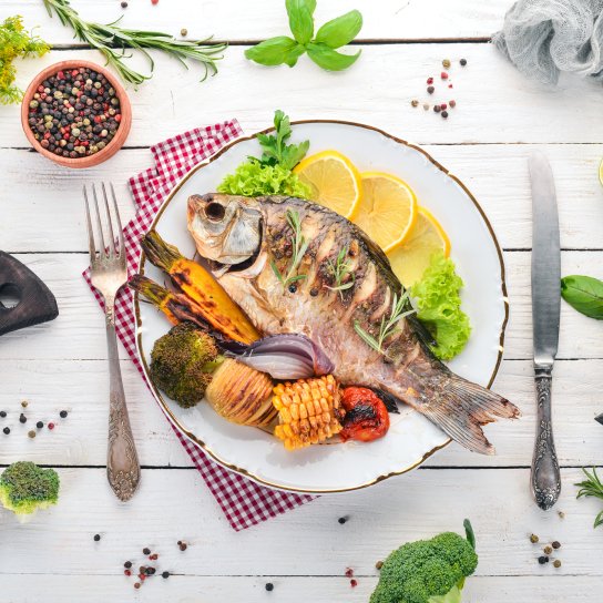 Карп с овощами