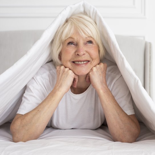 Жінка в ліжку