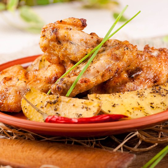 Запечена курятина з картоплею