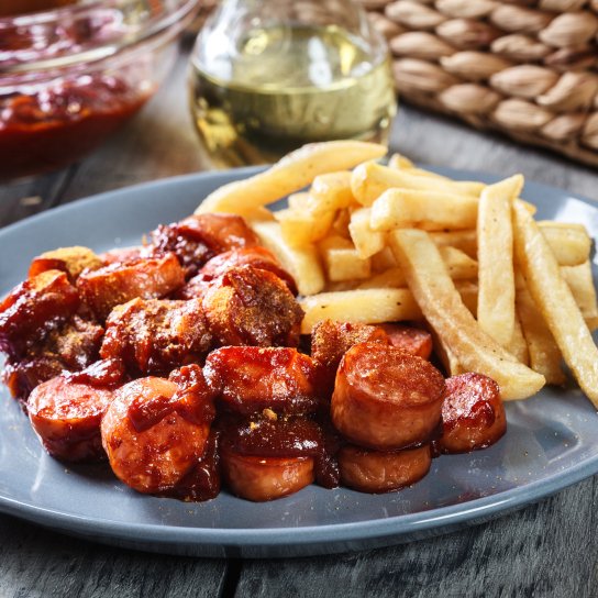 Сосиски в соусі