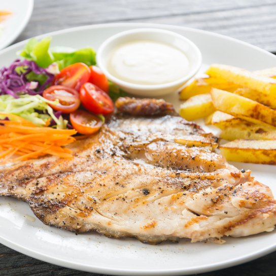 Тиляпія з овочами