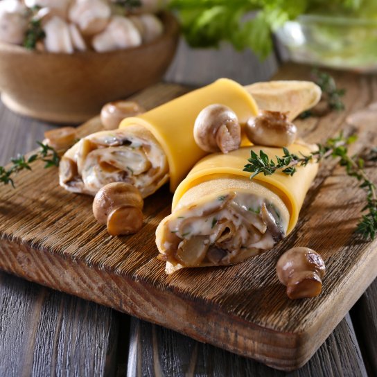 Млинці з печерицями і сиром