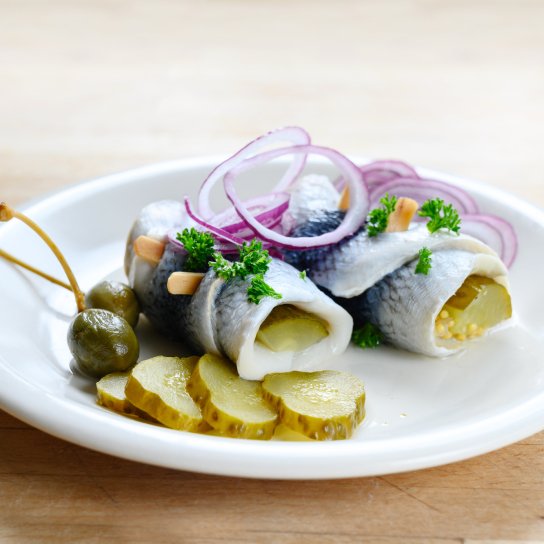 Оселедець з корнішонами