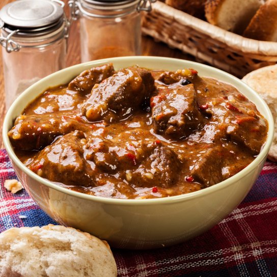 Тушкована свинина