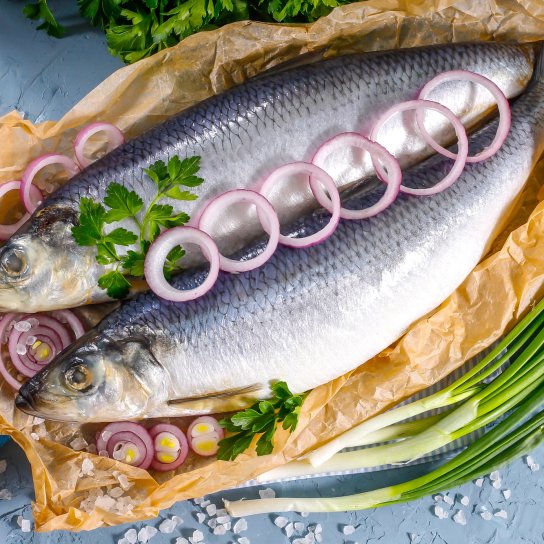 Оселедець, засолений в яблуках