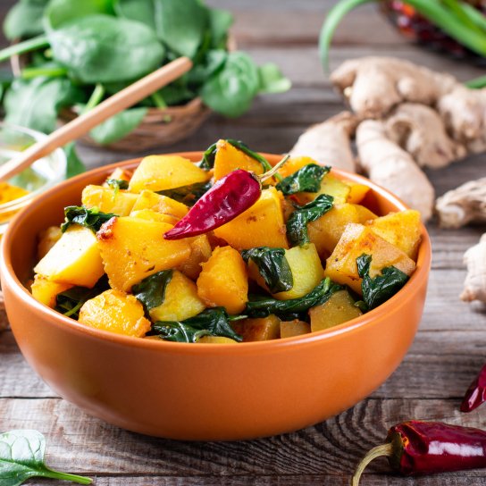 Пряна картопля зі шпинатом