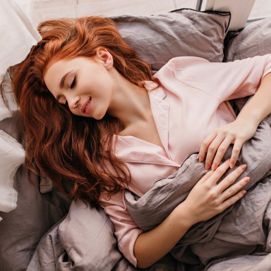 Жінка в ліжку