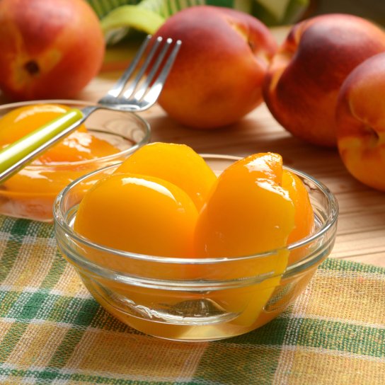 Персики, консервовані половинками