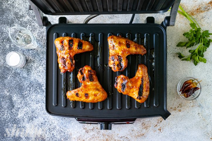 запечені крильця на грилі