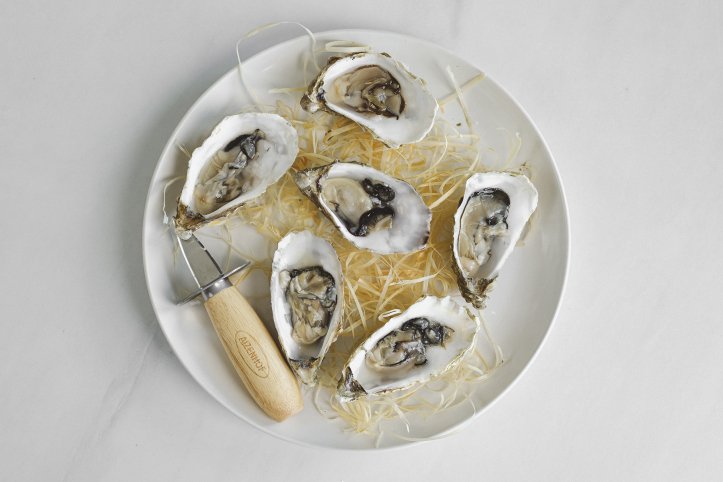 відкриті устриці