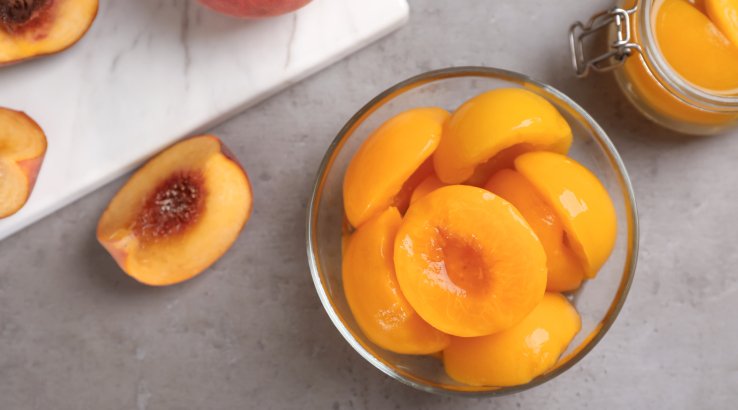 Персики у солодкому сиропі