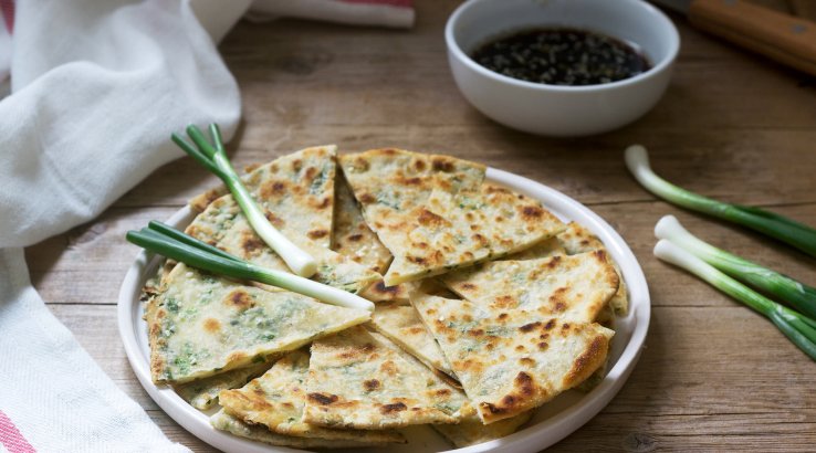 млинці з зеленою цибулею