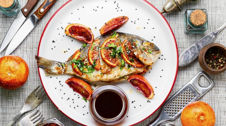 Запечена дорада з цитрусами